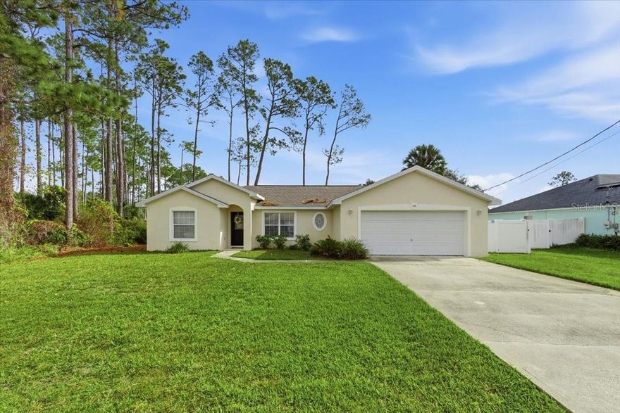 Discover your next home in the highly sought-after Lehigh Woods community of Palm Coast! This beautifully maintained 3-bed, 2-bath residence with a 2-car garage is built to last with solid concrete-block construction and crisp stucco exterior. Fresh landscaping welcomes you into a bright, open split floor plan featuring vaulted ceilings, a spacious kitchen island, indoor laundry, and stylish newer flooring and paint throughout.

Step outside to enjoy a large, fully fenced backyard and a newly screened patio—perfect for morning coffee or evening relaxation. Major systems have been thoughtfully updated, including a 2021 roof, 2024 A/C, 2021 water heater, and 2022 fencing. City water. Truly turn-key and move-in ready!

Don’t miss your chance to see this exceptional home—schedule your visit today!