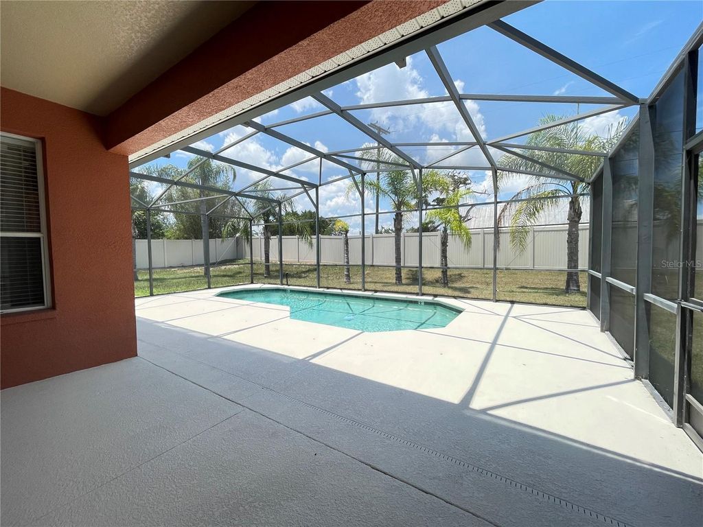 Photo of 907 Wildflower Road, Davenport, FL 33837 (MLS # O6358845)