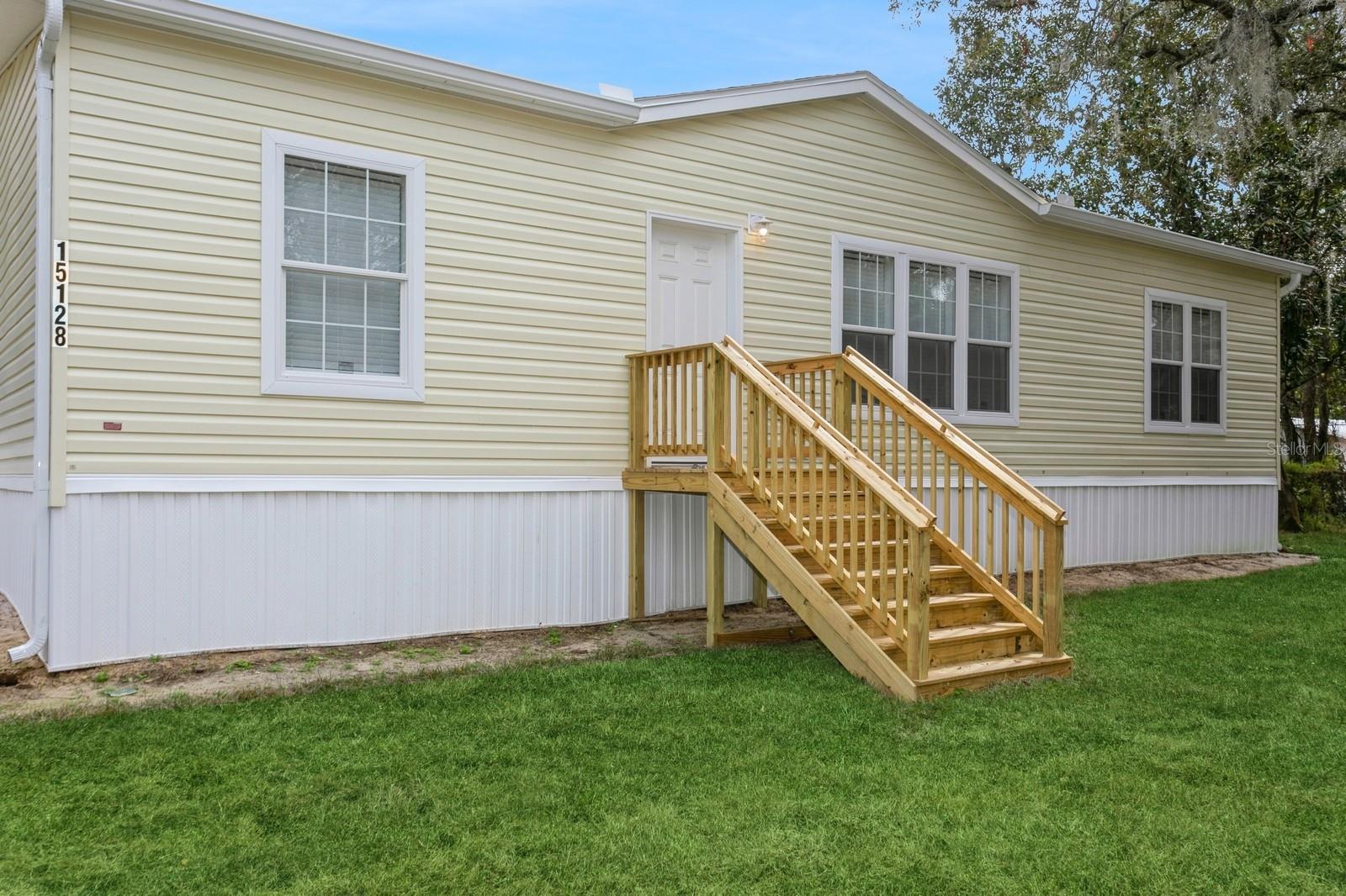 As you enter through the front door of this stunning manufactured home, you are greeted by a spacious great room, which provides an elegant space for entertaining guests. To the far right is a spacious primary bedroom and bathroom that features dual sinks, a large separate shower. The chef's kitchen seamlessly connects to an open great room featuring ample space for gathering. The location of the home is very convenient with close proximity to shopping, restaurants, and more. This is a Fannie Mae HomePath Property