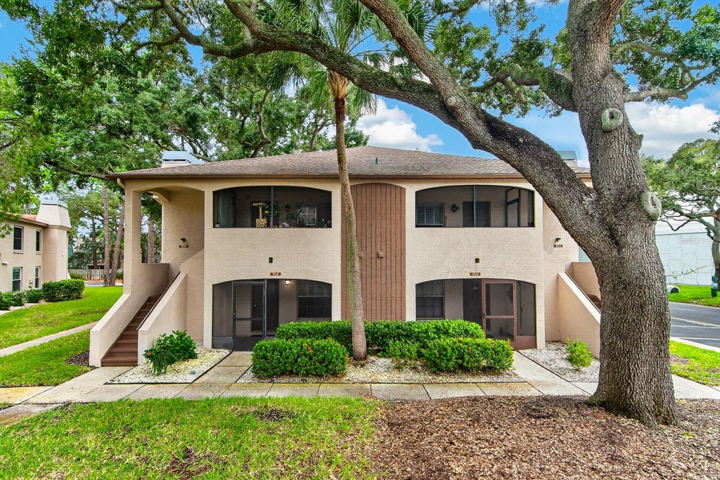 Photo of 2998 Bonaventure Circle #104, Palm Harbor, FL 34684 (MLS # TB8551960)