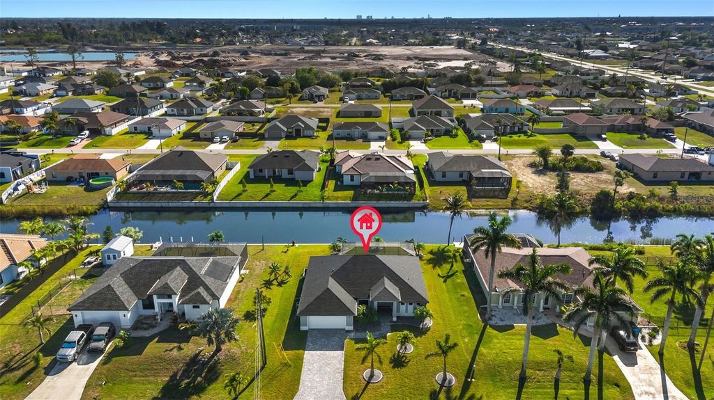 Photo of 25 NW 14th Avenue, Cape Coral, FL 33993 (MLS # A4679468)