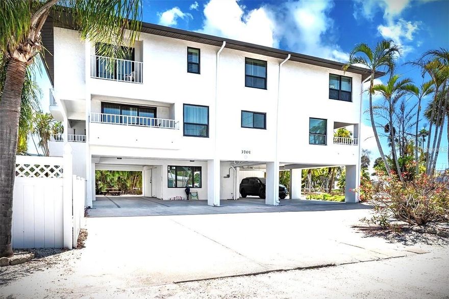 Gulf View Town Houses Condominium is one of a few select small association properties nestled just south of Manatee Public Beach.  Just far enough away for a quiet beach day and just close enough to be an attractive location for vacation renters.  A convenient grocery store and shopping district are just 1/8 mile east of this Holmes Beach condominium, making errands a breeze. The Association has been diligent and timely with their maintenance and repairs of the building and common elements, which are in tip top shape. Beach access is a short 150-yard walk west, offering the public beach restaurant and tiki bar just a short stroll north. This is one of the premier weekly rental locations in Holmes Beach and Anna Maria Island as a whole. Unit #1 has two designated parking spaces, a small first floor storage shed, and is one of just four units in this intimate single building condominium complex with heated pool on a spacious corner lot.  West facing, with tons of light, this spacious two story 2 bed 2.5 bath condominium is the ultimate in hassle free island living for both owners and renters.  On the first floor you will find tile floors throughout an open floor plan with an all-wood cabinet galley kitchen with induction cook top/range and hood, nice breakfast nook, and large living room with ½ bath.  The kitchen also features full matching stainless GE Profile line appliances in great shape. A 5x12 ft balcony just off the living room is perfect for sunset viewing and windows and doors are hurricane rated and have been replaced in the past few years. Upstairs find the Primary en-suite bedroom with private west facing balcony and full tile bath with whirlpool tub and separate shower.  The guest bedroom is also roomy with private full tile shower bathroom.  The laundry room with washer and dryer are also found on the second floor.  Definitely schedule a showing to take a closer look!  Thanks