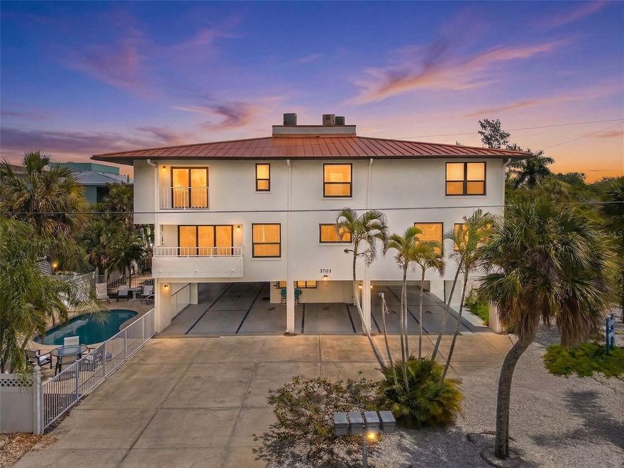 Gulf View Town Houses Condominium is one of a few select small association properties nestled just south of Manatee Public Beach.  Just far enough away for a quiet beach day and just close enough to be an attractive location for vacation renters.  A convenient grocery store and shopping district are just 1/8 mile east of this Holmes Beach condominium, making errands a breeze. The Association has been diligent and timely with their maintenance and repairs of the building and common elements, which are in tip top shape. Beach access is a short 150-yard walk west, offering the public beach restaurant and tiki bar just a short stroll north. This is one of the premier weekly rental locations in Holmes Beach and Anna Maria Island as a whole. Unit #1 has two designated parking spaces, a small first floor storage shed, and is one of just four units in this intimate single building condominium complex with heated pool on a spacious corner lot.  West facing, with tons of light, this spacious two story 2 bed 2.5 bath condominium is the ultimate in hassle free island living for both owners and renters.  On the first floor you will find tile floors throughout an open floor plan with an all-wood cabinet galley kitchen with induction cook top/range and hood, nice breakfast nook, and large living room with ½ bath.  The kitchen also features full matching stainless GE Profile line appliances in great shape. A 5x12 ft balcony just off the living room is perfect for sunset viewing and windows and doors are hurricane rated and have been replaced in the past few years. Upstairs find the Primary en-suite bedroom with private west facing balcony and full tile bath with whirlpool tub and separate shower.  The guest bedroom is also roomy with private full tile shower bathroom.  The laundry room with washer and dryer are also found on the second floor.  Definitely schedule a showing to take a closer look!  Thanks *A FEW PHOTOS ARE VIRTUALLY STAGED*