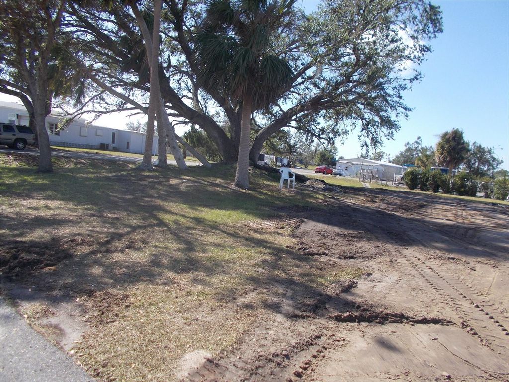 Photo of 5636 Holiday Park Boulevard, North Port, FL 34287 (MLS # C7469800)