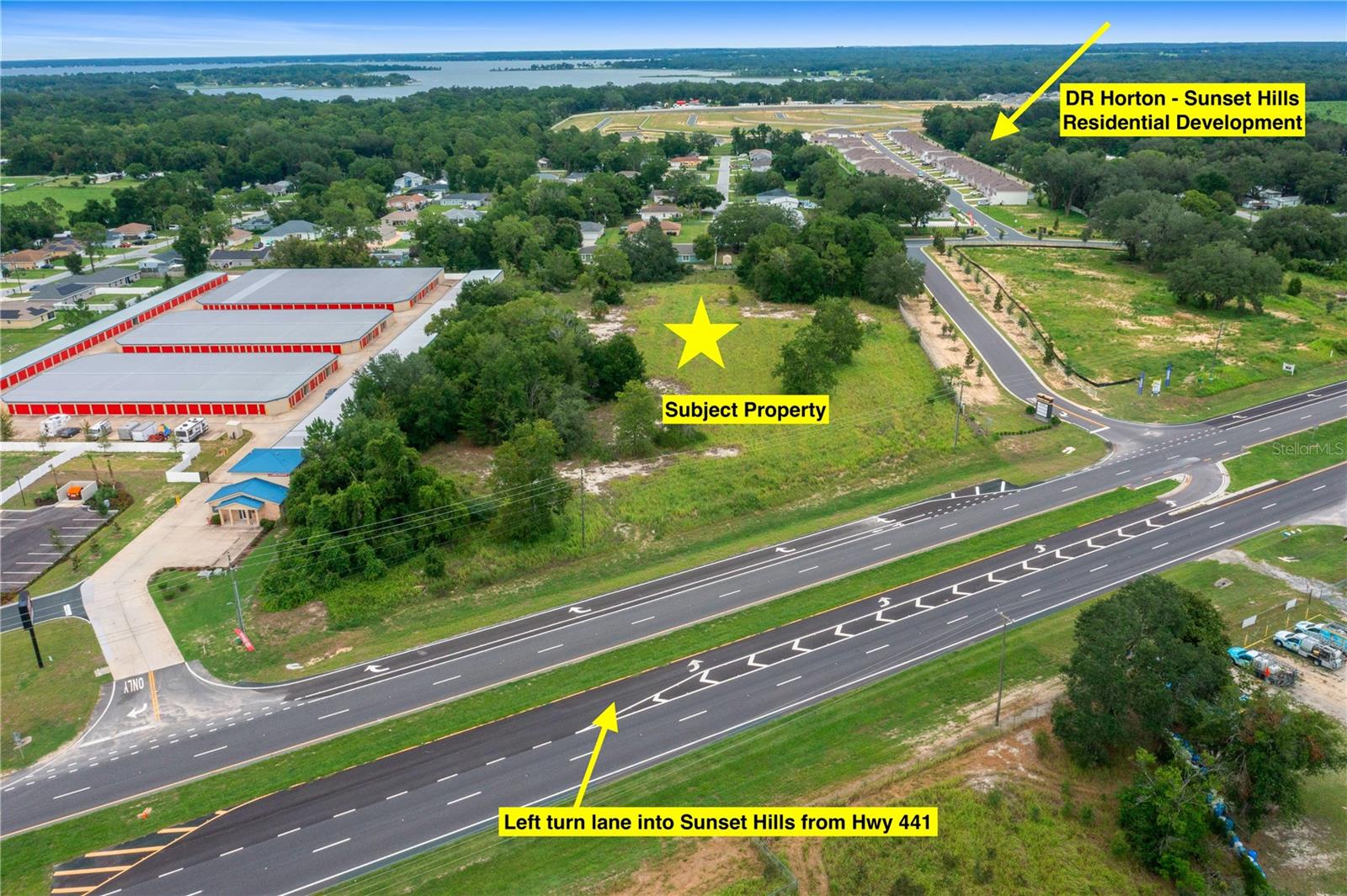 Positioned along the highly traveled Highway 441 corridor in Summerfield, Florida, this prime 4.32-acre parcel offers exceptional visibility and commercial potential. Zoned B2 and predominantly cleared, the property is development-ready and strategically located between the rapidly growing communities of The Villages and Belleview. With an average daily traffic count of 35,000 vehicles, it presents a high-exposure opportunity for retail, service, or mixed-use development.
The site sits directly in front of the new Sunset Hills residential community (345 homes) by DR Horton, where Phase 1 has been completed and Phase 2 is nearing full buildout. Accessibility is a key asset, with a dedicated southbound left-turn lane off Hwy 441 and a shared easement entrance via Sunset Hills, making ingress and egress efficient for future customers or clients. A current survey is available, and the owner is open to either a purchase or ground lease arrangement.
Surrounding commercial growth underscores the area’s upward momentum. Just to the north, a new RaceTrac station anchors the corner of Hwy 441 and Sunset Harbor Road, while the adjacent Heritage Hills Shoppes and CubeSmart Storage add to the corridor's emerging retail landscape.
This property also benefits from its proximity to The Villages—one of the fastest-growing metro areas in the nation. The Villages consistently ranks among the top in the U.S. for population growth, adding over 35,000 residents since 2020. Likewise, the Ocala Metro has seen explosive expansion, recently ranking as the #2 fastest-growing metro in Florida and #6 in the nation according to U.S. Census data. These trends point to a bright future for commercial investment in this corridor.