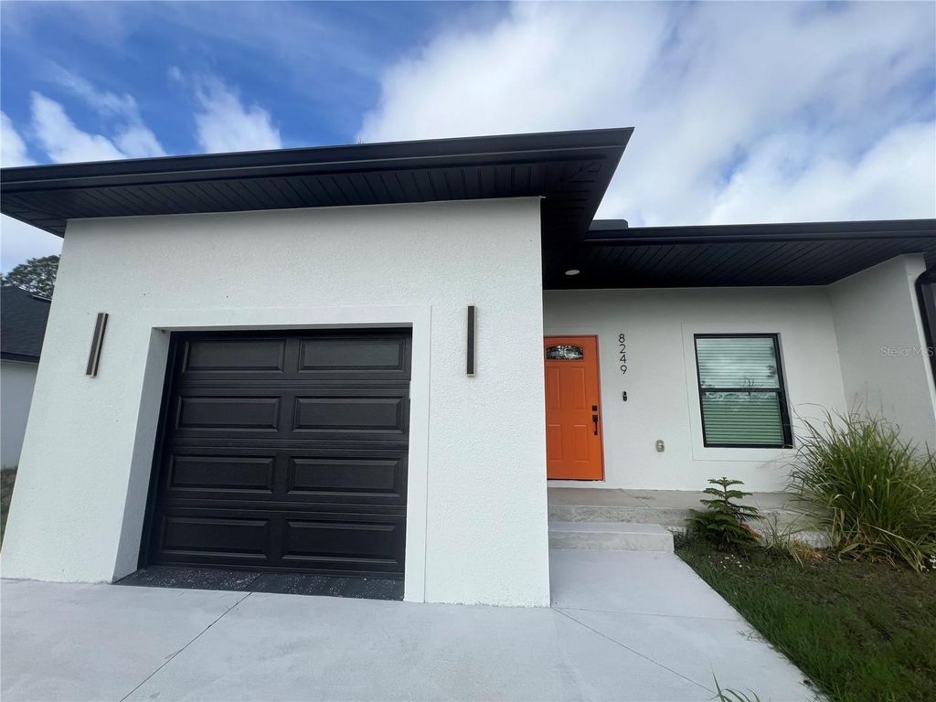 Photo of 8249 Dimstead Street, Port Charlotte, FL 33981 (MLS # C7523431)