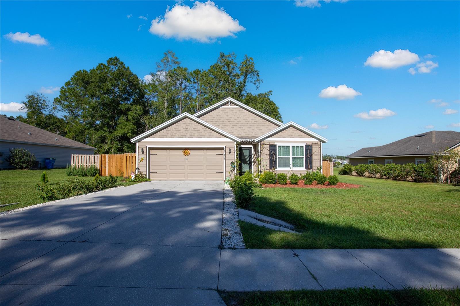 Welcome to this beautiful 4-bedroom, 2-bathroom home located in the highly desirable Bailey Estates subdivision of High Springs, Florida. Built in 2021 and boasting 1,768 square feet of open, modern living space this home offers the perfect blend of comfort, functionality, and style. This is currently one of only three 4-bedroom homes on the market in Bailey Estates, making it a rare find you won't want to miss! Step inside to discover a spacious open floor plan with a large kitchen that flows seamlessly into the dining and living areas, perfect for entertaining or relaxing with family. The master suite features a generously sized walk-in closet and a private en-suite bathroom, offering a peaceful retreat at the end of the day. Additional highlights include spacious 2-car garage, conveniently close to top rated schools like Santa Fe High School, and a modern construction build with only minor paint touch-ups needed. Situated in the heart of High Springs, this home offers more than just a place to live-it's a lifestyle. Enjoy weekend adventures at Blue or Poe Springs, explore the historic downtown district with charming shops and cafes, or paddle the Santa Fe River for scenic outdoor fun. High Springs has small-town charm, known for its natural beauty and friendly community. Don't miss your chance to own this standout home in a prime location, schedule your private tour today!