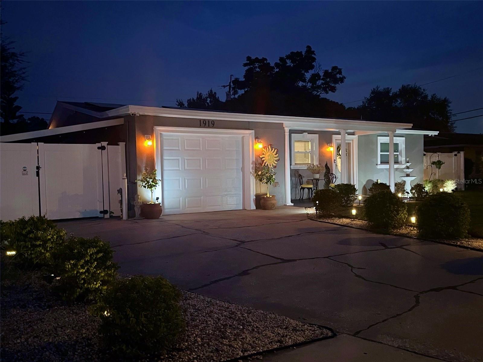 Welcome to this beautifully updated 3 bedroom 2 bath block home featuring a screened saltwater pool and spa. This move-in ready property has been meticulously maintained, with major updates completed within the past 8 years, including owned solar panels, windows and doors, AC, bathrooms, kitchen, waterproof laminate flooring and roof. Enjoy energy efficiency and convenience with natural gas for cooking, gas dryer and a gas on demand water heater. The freshly painted exterior enhances curb appeal while the fully vinyl fenced yard provides privacy and security. Parking is a breeze with an attached one car garage plus an additional covered carport. This home offers the perfect blend of style, comfort and modern upgrades----schedule your showing today.