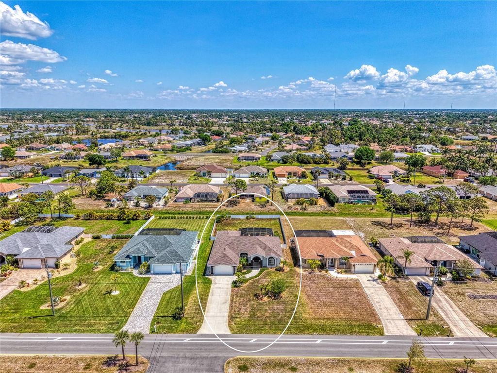 Photo of 202 Rotonda Boulevard N, Rotonda West, FL 33947 (MLS # D6146753)