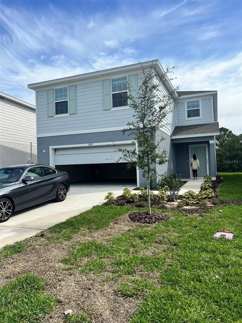 Single Family Residence in CLERMONT FL 1009 RIVERS CROSSING ST St.jpg