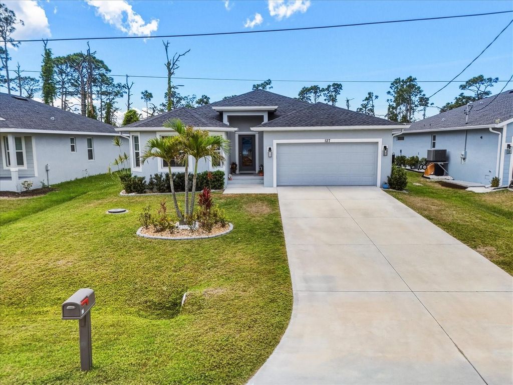 Photo of 127 Glades Drive, Rotonda West, FL 33947 (MLS # C7524516)