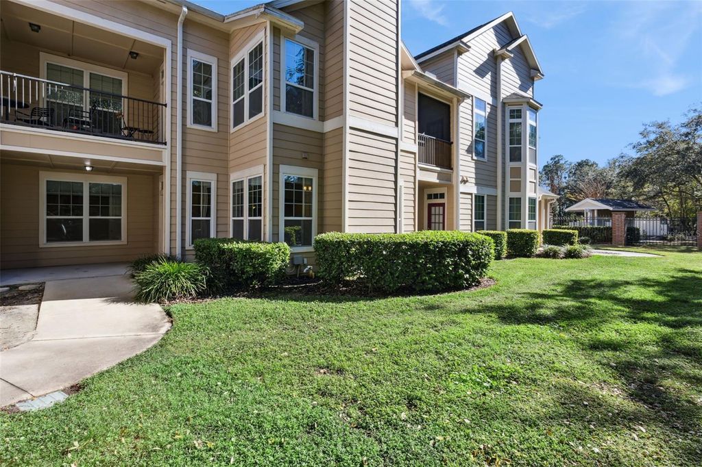 Photo of 1101 Vintage Village Lane #104, Ocoee, FL 34761 (MLS # O6374909)