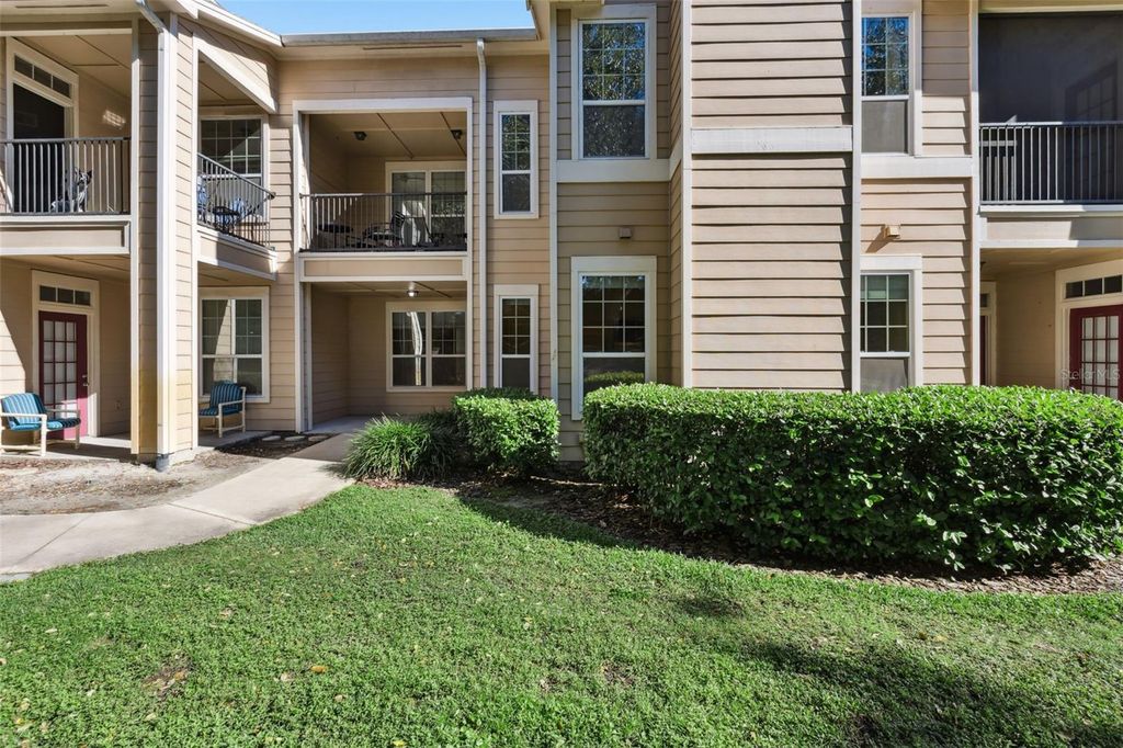 Photo of 1101 Vintage Village Lane #104, Ocoee, FL 34761 (MLS # O6374909)