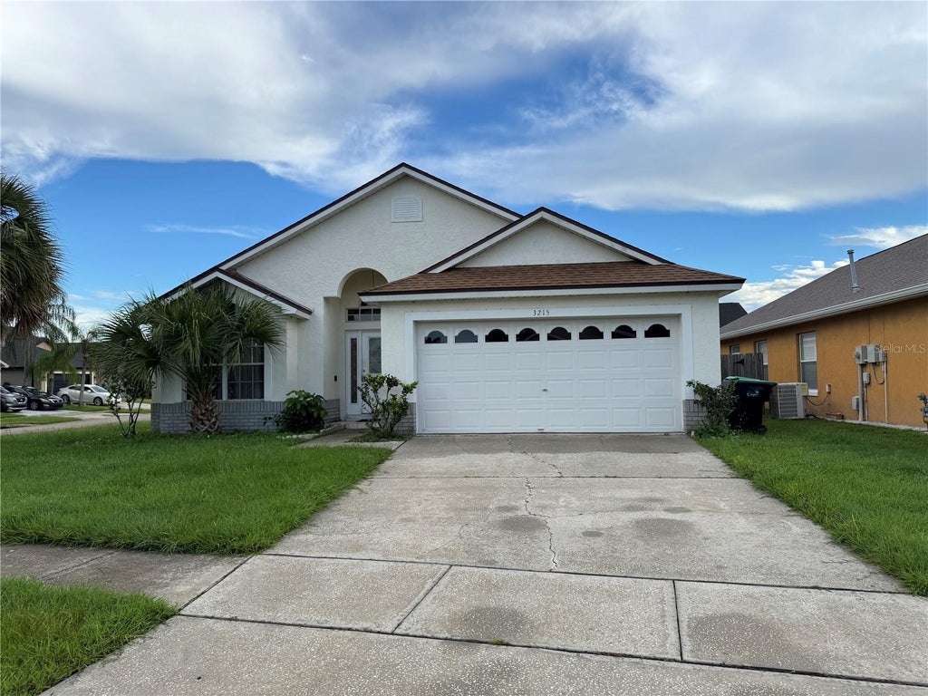 Photo of 3215 Crystal Creek Boulevard, Orlando, FL 32837 (MLS # O6441719)
