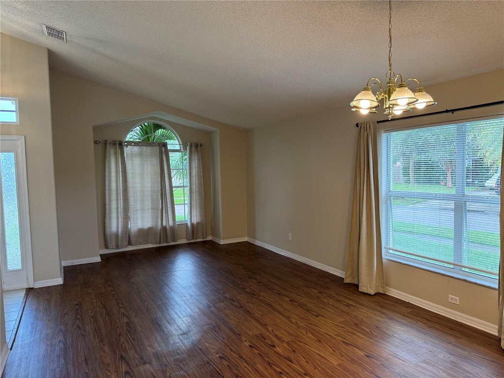 Photo of 3215 Crystal Creek Boulevard, Orlando, FL 32837 (MLS # O6441719)