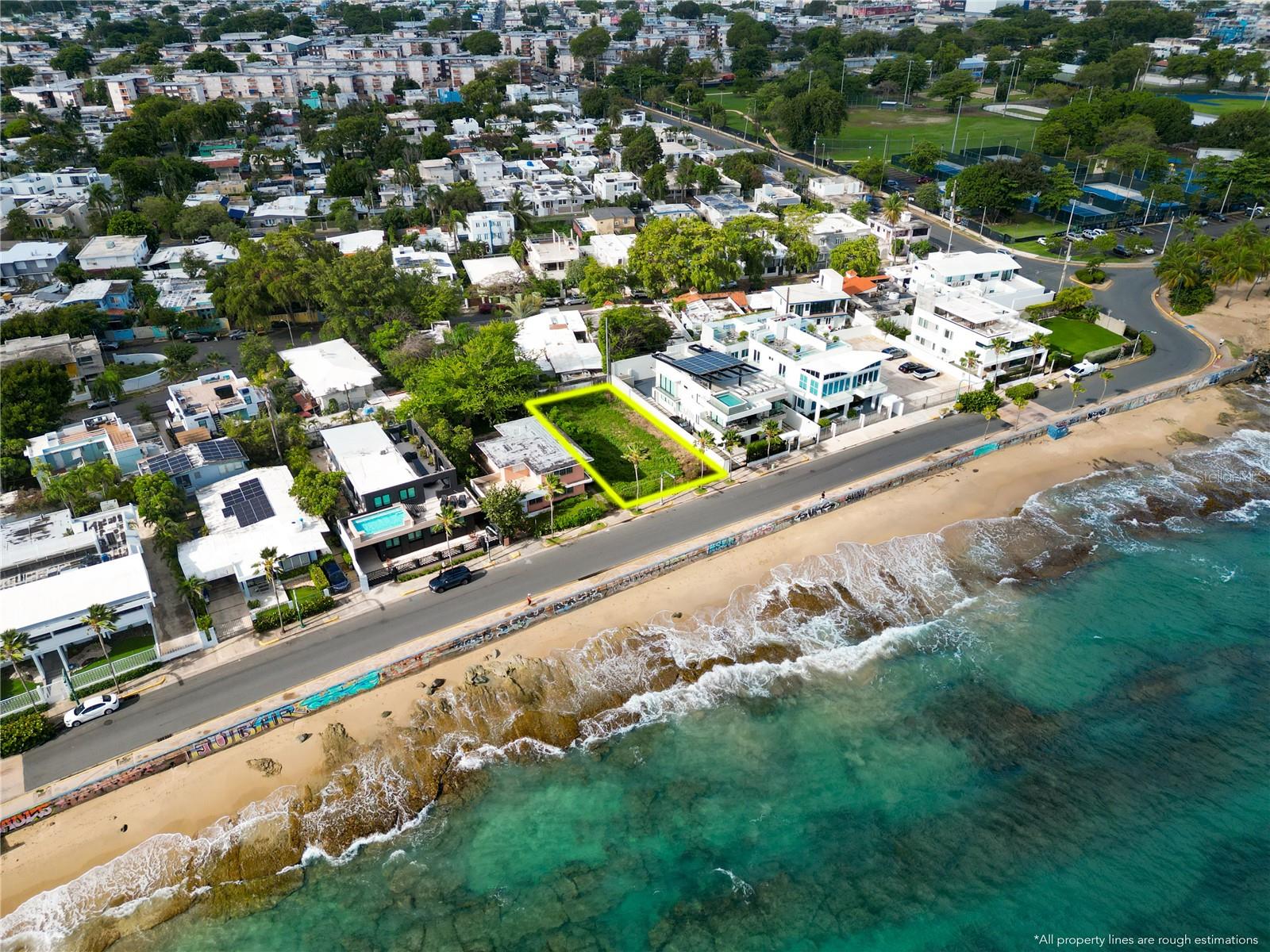 Don’t miss this rare opportunity to own the last available lot in the desirable Park Boulevard Street. The prime 525 SM parcel offers the perfect setting to build your custom luxury home just steps from the sand. Perfectly positioned for unobstructed ocean views, this exceptional lot offers the ultimate coastal lifestyle in one of the most sought-after locations.
Just one block away is Barbosa Park, currently undergoing a full renovation, which will feature tennis courts, a soccer field, a running track, and a children’s playground—perfect for an active lifestyle or family-friendly living. Walk along the beach and you’ll find yourself at the vibrant and popular Ocean Park Beach. You’re also just a few blocks from Calle LoÃza, one of San Juan’s most dynamic areas, offering an eclectic mix of trendy restaurants, cafes, boutiques, and a thriving local scene.
This lot is completely build-ready, with all permits approved, and includes architectural plans for a stunning 8,000 square foot modern beachfront home. A trusted construction crew is ready to begin immediately, allowing you to move forward without delays.