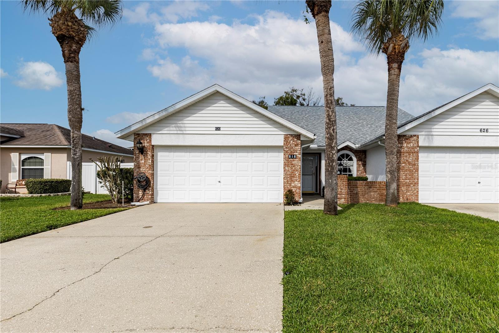 Become the proud new owner of this charming 1/2 duplex in Tavares, FL. Located at 630 Woodview Drive, this home is ready for a new family to call it their own. Situated on a quiet street with no HOA, it offers convenient access to everything you need. This home features 1328 square feet, 3 bedrooms, 2 bathrooms, and a 2-car garage. The kitchen provides ample storage, all appliances are included, and a corner nook is perfect for a breakfast table to enjoy your morning coffee. The open floor plan, combining the living room and dining room, is ideal for entertaining family and friends. French doors from the living room lead to a sizable screened-in back porch overlooking the backyard. The spacious primary bedroom, located at the rear of the home, includes an en-suite bathroom. The two additional bedrooms share the guest bathroom and each offer built-in closets and ceiling fans. Located not far from Downtown Tavares, Shopping, Restaurants and major Highways. This home is perfect for first-time buyers, those looking to downsize, or as an investment property. Call today to schedule a private tour! All information recorded in the MLS is intended to be accurate however, it should be independently verified by buyer and their agent.