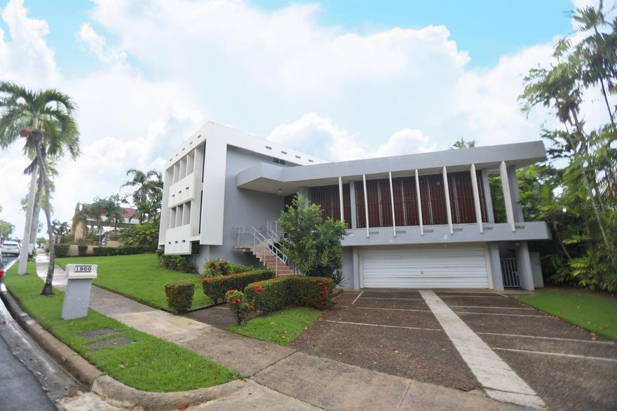 Located in the exclusive Santa María community in San Juan, Puerto Rico. This spectacular residence designed by architect Henry Klumb  showcase and elegant tropical style with excellent cross ventilation, maximizing natural light and airflow. Offering 4,585 square feet of living space on an approximately 1400 square meter lot, the property features five spacious bedrooms and  four and a half bathrooms, ideal for comfortable family living. It's prime location places it near top school, hospitals and supermarkets, providing both convenience and quality of life. The property  is also equipped with a 20 kilowatts Kohler diesel generator, a water tank and elevator, ensuring functionality and peace of mind.