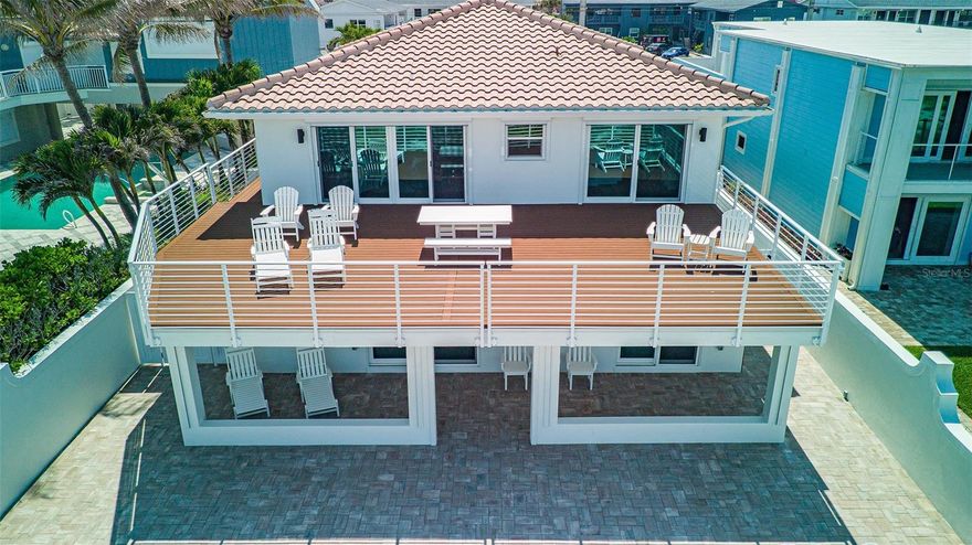This luxurious oceanfront property in the heart of Cocoa Beach is a must-see for any beachlover! After being remodeled in 2023, this home boasts a fully-renovated interior. Peace of mind is brought to you by new hurricane-rated windows and shutters, new plumbing and electric, updated HVAC, W/H, and new roof. An entertainer's dream featuring a spacious sun deck and outdoor fire pit with incredible beach views. Don't forget to take a dip in the oversized eight-foot deep pool! Top it off with brand new furniture professionally decorated. Whether you're looking for a turnkey vacation home with multiple amenities or beach rental, this property has it all and is ready to go. Coastal living could be yours, all within walking distance to Downtown Cocoa Beach, shopping and restaurants.