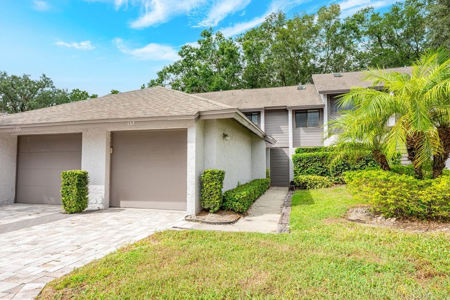 Welcome to your new home sweet home in Montgomery Club – a charming, well maintained community perfectly situated in the heart of Altamonte Springs! This spacious TOWNHOUSE STYLE condo features a peaceful, private COURTYARD ENTRANCE, perfect for enjoying your morning coffee or winding down in the evenings. The interior is as functional as it is inviting, with TWO OVERSIZED PRIMARY SUITES, each boasting generous closet space and en-suite bathrooms for ultimate privacy and comfort. The larger of the two suites includes a versatile bonus space – ideal for a home office, reading nook or cozy retreat. The main living area centers around a warm wood burning FIREPLACE, with a separate dining space and a kitchen that opens directly to the courtyard, creating a seamless indoor/outdoor feel. A bright dinette space in the kitchen and a convenient half bath adds even more flexibility. Notable UPDATES include: NEW PAVERS and drainage system in the courtyard (2021) ~ NEW BLINDS throughout (2021) ~ UPDATED PRIMARY BATH SHOWER GLASS (2024) ~ Carpet on stairs replaced (2021) ~ TILE & WOOD LAMINATE FLOORING THROUGHOUT! You will appreciate GARAGE & DRIVEWAY PARKING, enjoy community AMENITIES like a sparkling pool and tennis courts, and quick access to I-4, shopping, dining, and local parks. With spacious bedrooms, LOW MAINTENANCE LIVING, and a tranquil setting, this home truly has it all. Don’t miss your chance to own in one of Altamonte Springs most convenient and desirable communities – call today to schedule a tour!