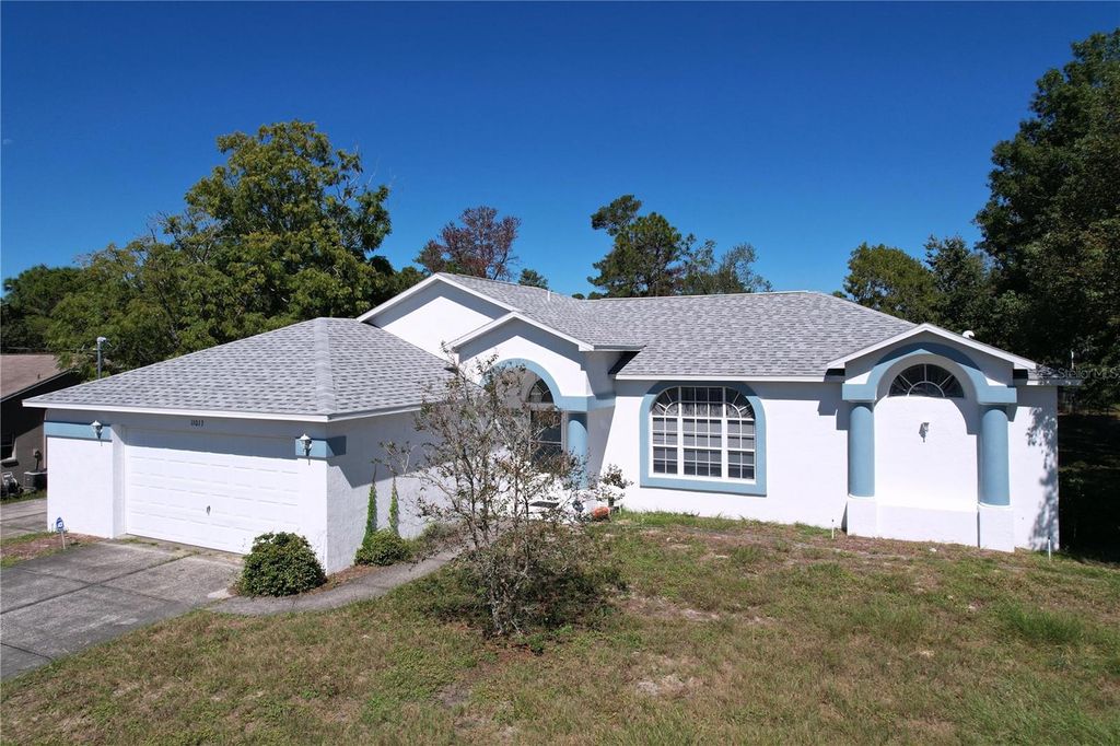 Photo of 11013 Calico Warbler Avenue, Weeki Wachee, FL 34613 (MLS # TB8434730)
