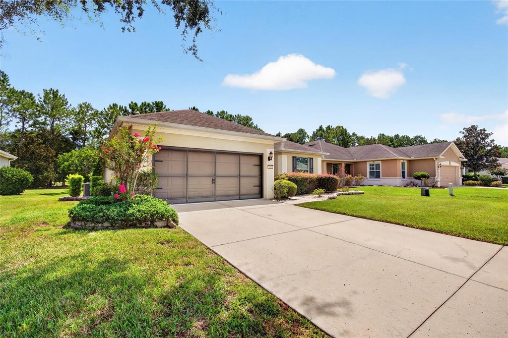 Photo of 9419 SW 66th Loop, Ocala, FL 34481 (MLS # OM732184)