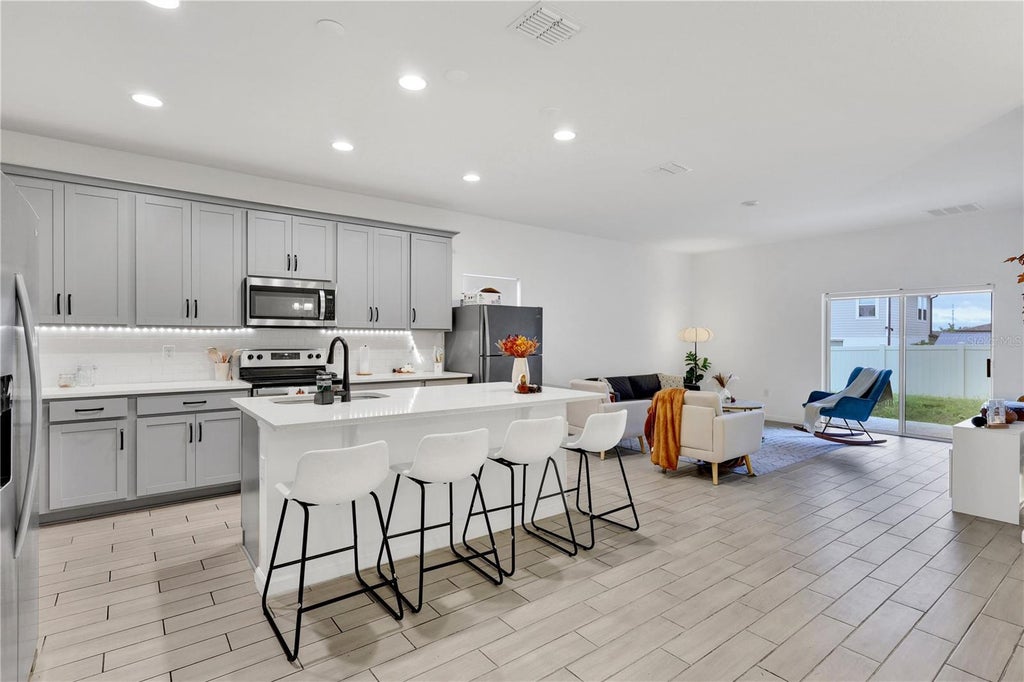 Photo of 5342 Maddie Drive, Haines City, FL 33844 (MLS # S5158990)