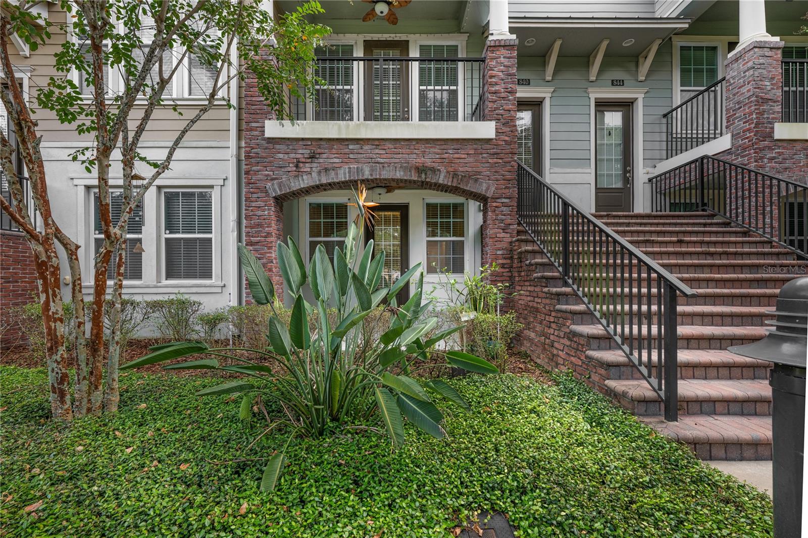 This beautifully maintained 3 bed / 3.5 bath townhome in The Hamptons at Oviedo in the Park offers the perfect combo of comfort, convenience, and community. It's an ideal location for busy professionals, growing families, or anyone who wants to spend less time on chores and more time living. Just up the stairs to the second floor, you can whip up meals in a gourmet kitchen with stone counters, stainless steel appliances, and a huge island made for Sunday brunches and late-night chats or simply enjoy the breathtaking views of nature from the living room. On the first floor, you will find a flexible guest suite or private home office, complete with its own full bath, walk-in closet, and access to a secluded patio. This level also includes a spacious 2-car garage with additional storage space and a convenient under-stair closet. On the top floor, you’ll find two spacious bedrooms and a conveniently located laundry room. The owner’s suite is a relaxing retreat, featuring a large walk-in closet and a spa-inspired bathroom with dual vanities and a luxurious walk-in shower complete with a rainfall showerhead. The second bedroom also offers its own private in-suite bath with a tub/shower combo, making it perfect for family, guests, or a stylish home office. For commuters, quick access to UCF, SR-417, and major highways means you’re never far from where you need to be. Schedule your showing today!