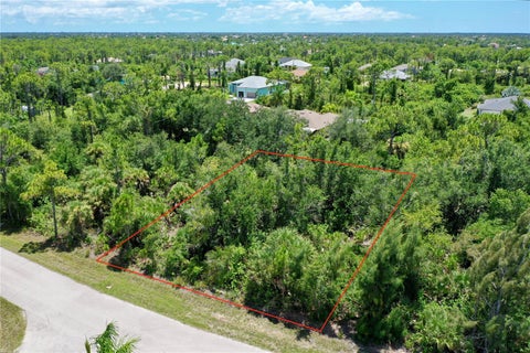Photo of 8289 Matecumbe Road, Port Charlotte, FL 33981 (MLS # C7529115)