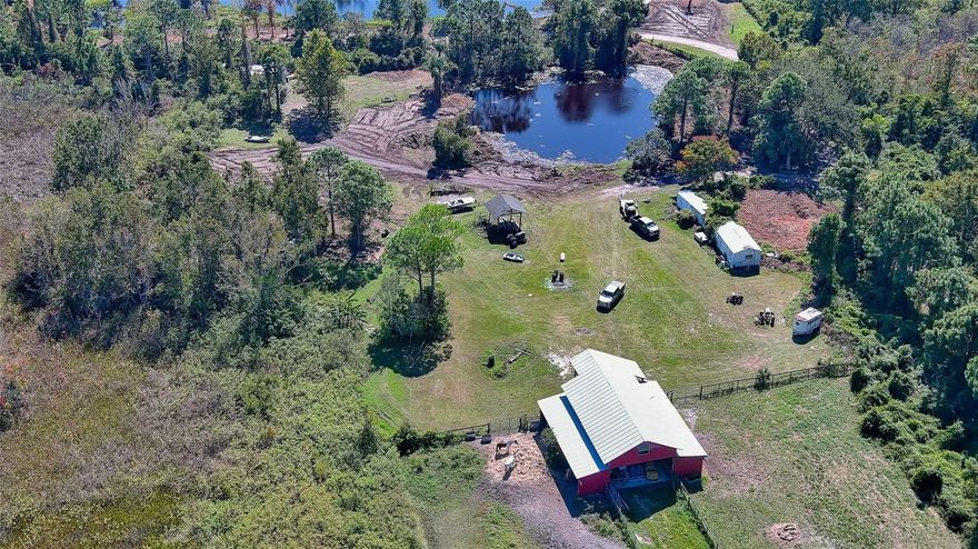 Almost 20 acres of beautiful Florida land.  Two deep ponds on property with 47 x 46 barn with loft and 8 horse stalls.  Fenced and crossed fenced with no climb horse fence.  Pond and well. Pole barn. Located on the Oak Hill Edgewater line.  This property has beautiful shade trees and tranquility.  Private location yet convenient to shopping and I-95. Possible owner financing with substantial downpayment.