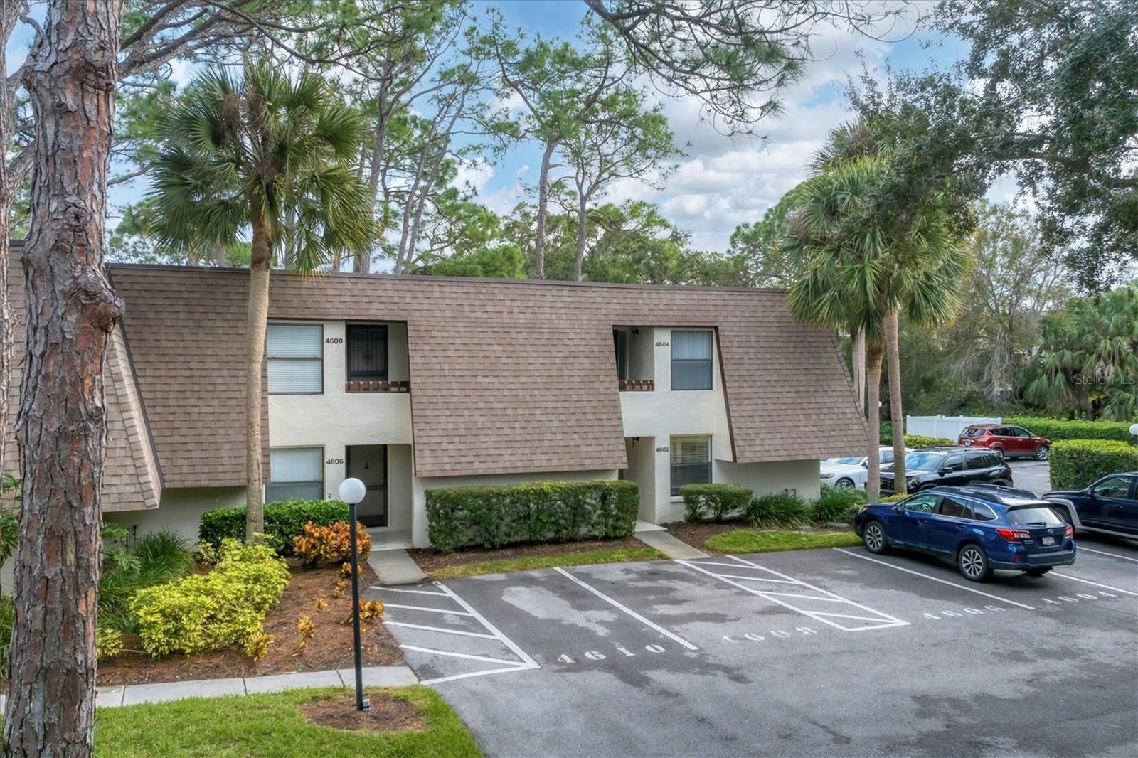 ANNUAL RENTAL: Charming ground-floor end unit condo in The Meadows featuring 2 bedrooms and 2 bathrooms. This home boasts an open floor plan with gleaming tile flooring throughout, an oversized screened lanai that overlooks the garden and pool area, and an additional storage closet for your golf or beach gear. Being an end unit, it benefits from extra natural light, enhancing the bright living space. Assigned parking is available, along with guest parking. Other features: interior laundry, private ensuite bath in the primary bedroom, split bedroom plan, large breakfast bar separating the kitchen and dining area, and a large interior closet for your extra storage needs. Amenities include a dog park, pools, playground, pickleball and tennis courts (tennis requires additional pay-per-play fees), walking and biking trails, basketball court, gardens, fishing, restaurants, shopping, a fitness and wellness center, community events, and a winter farmer’s market. Located conveniently in The Meadows, it provides easy access to beaches, Downtown Sarasota, University Town Center, Downtown Lakewood Ranch, I-75, Nathan Benderson Aquatic Center Mote Marine Aquarium, and the stunning white sandy beaches of the Gulf. Note that overnight parking for trucks and commercial vehicles is prohibited, and the owner reserves the right to require renter’s insurance. The application process involves two steps with associated fees. This delightful, unfurnished condo is available for immediate occupancy under a 1-year lease. Utilities are the tenant's responsibility, and approval is required. The unit is being rented unfurnished, and the owner will consider a small pet with a deposit and association approval. Enjoy the community's parks, 85 beautiful lakes and waterways, shopping village, and 14 miles of walking and biking trails. With this prime location, you’re just 10 minutes from the vibrant arts and culture of downtown Sarasota, 15 minutes from the shops at St. Armand’s Circle, and 25 minutes from the stunning beaches of Siesta Key.