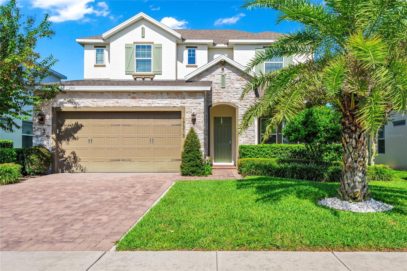 Beautiful move-in ready 4-bedroom, 2.5-bathroom home with a two-car garage located in the highly desirable Waterside community! Built in 2019, this stunning home features an open floor plan designed for modern living. The primary suite is conveniently located on the FIRST floor, showcasing an upgraded walk-in closet and a luxurious walk-in shower. The great room and breakfast nook seamlessly open to a covered lanai through sliding glass doors, creating the perfect flow for indoor-outdoor living and entertaining. Enjoy the best of Winter Garden living—close to top-rated schools, charming downtown shops and restaurants, and all the area’s most popular attractions. This is truly a must-see home!