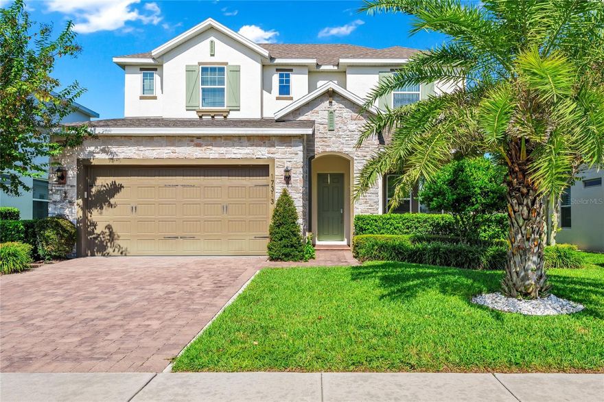 Beautiful move-in ready 4-bedroom, 2.5-bathroom home with a two-car garage located in the highly desirable Waterside community! Built in 2019, this stunning home features an open floor plan designed for modern living. The primary suite is conveniently located on the FIRST floor, showcasing an upgraded walk-in closet and a luxurious walk-in shower. The great room and breakfast nook seamlessly open to a covered lanai through sliding glass doors, creating the perfect flow for indoor-outdoor living and entertaining. Enjoy the best of Winter Garden living—close to top-rated schools, charming downtown shops and restaurants, and all the area’s most popular attractions. This is truly a must-see home!