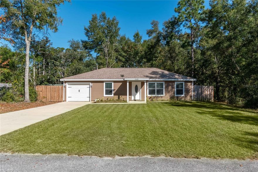 Beautiful 2024 New Construction Home. This lovely, cute 3/2 bungalow design home offers relaxed, affordable living in the country but still close to amenities. You'll appreciate features of luxury vinyl plank flooring throughout, contemporary lighting, ceiling fans, custom blinds, and low E windows. The open floor plan features a very nice kitchen with all new stainless energy star appliances, granite countertops and wood cabinetry. Master bath features subway tile and gorgeous marble surfaces. Large indoor laundry room and pantry. Situated on a private paved street with adjacent wooded lots. This is an excellent opportunity for the first time home buyer or someone looking to downsize. Enjoy outdoor living in the fully fenced backyard. The vacant lot next door is also for sale if you are looking for a bigger piece of property. Starlink was installed in April and the AC was just serviced as well. No HOA and low Levy County taxes. Conveniently located within easy travel to Gainesville, Ocala, Dunnellon and Crystal River. Come check it out today!!!