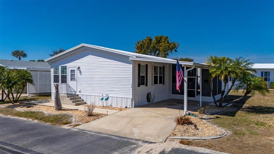 Situated in Port Charlotte Village, a resident-owned 55+ community voted #1 in Charlotte County in 2024, this beautifully maintained furnished 3-bedroom, 2-bath home offers a peaceful water view and is not located in a flood zone. The home features a bright, open floor plan that flows effortlessly between the living, dining, and kitchen areas, creating an inviting space ideal for everyday living and entertaining.
The kitchen is generously sized with custom butcher block countertops, abundant cabinetry, and a large eat-in area, in addition to a separate formal dining room—perfect for hosting family and guests. Spacious bedrooms include large walk-in closets, providing excellent storage throughout the home.
Enjoy Florida’s indoor-outdoor lifestyle from the screened-in patio, freshly painted in 2026 along with the stair railings, offering a relaxing retreat to enjoy the surrounding water views. Additional highlights include a covered carport, a large she-shed/workshop, and tasteful furnishings throughout.
Recent updates provide peace of mind, including a roof replaced in 2022, water heater replaced February 2026, pressure washing completed February 2026, and an updated 4-point inspection. The community offers three freshwater lakes, a pool, clubhouse, recreational facilities, and a full calendar of resident activities, all conveniently located near shopping, dining, golf courses, medical facilities, entertainment, and Southwest Florida’s beautiful sandy beaches.