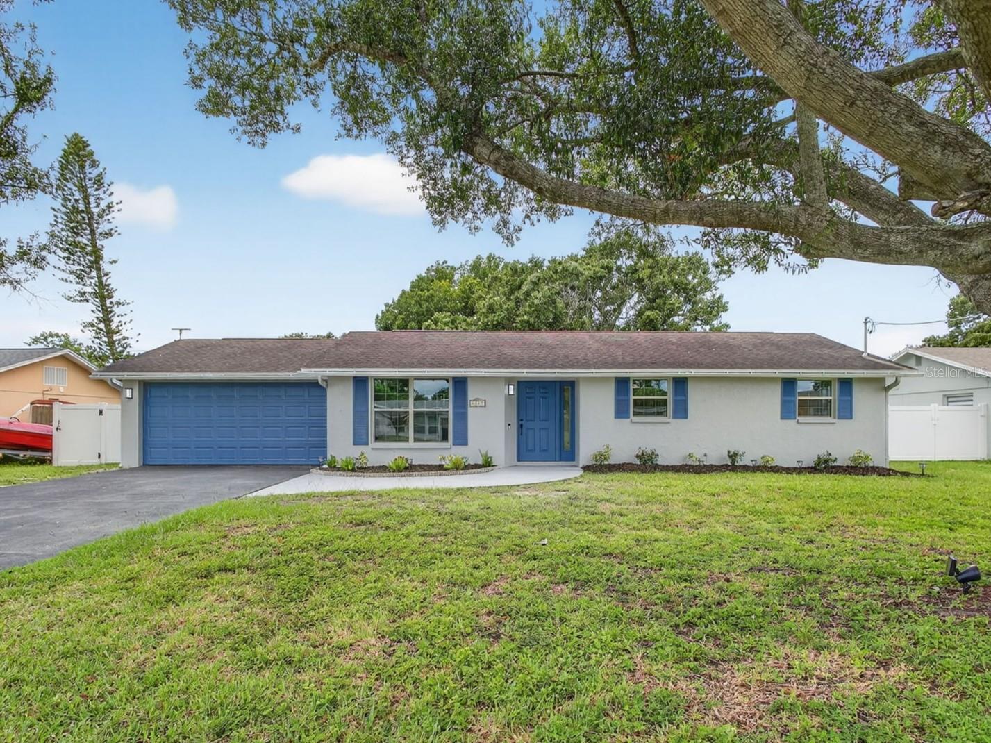 Located in the sought-after community of Apollo Beach, this FULLY RENOVATED 3 bedroom, 2 bathroom home sits on a spacious .23-acre fenced-in lot and offers the perfect blend of modern updates and coastal living. From the moment you arrive, you’ll notice the beautiful curb appeal with manicured landscaping and a two-car garage. Inside, the home features brand-new luxury vinyl plank flooring, modern light fixtures, and an open floor plan that creates a bright and inviting atmosphere. The updated kitchen is designed with stainless steel appliances, quartz countertops, and a stylish layout that opens seamlessly to the living and dining spaces. Each bedroom is filled with natural light and equipped with ceiling fans, while both bathrooms have been renovated with contemporary vanities and tile finishes. The screened-in patio overlooks the large fenced backyard, providing plenty of room for outdoor gatherings, pets, or simply enjoying Florida sunsets. This prime Apollo Beach location places you minutes from the Apollo Beach Marina public boat ramp, the Apollo Beach Park and Recreation Center with its playground, dog park, and jogging trail, and the popular Manatee Viewing Center. Don’t miss your opportunity to own this move-in ready gem in one of the area's most desirable communities!