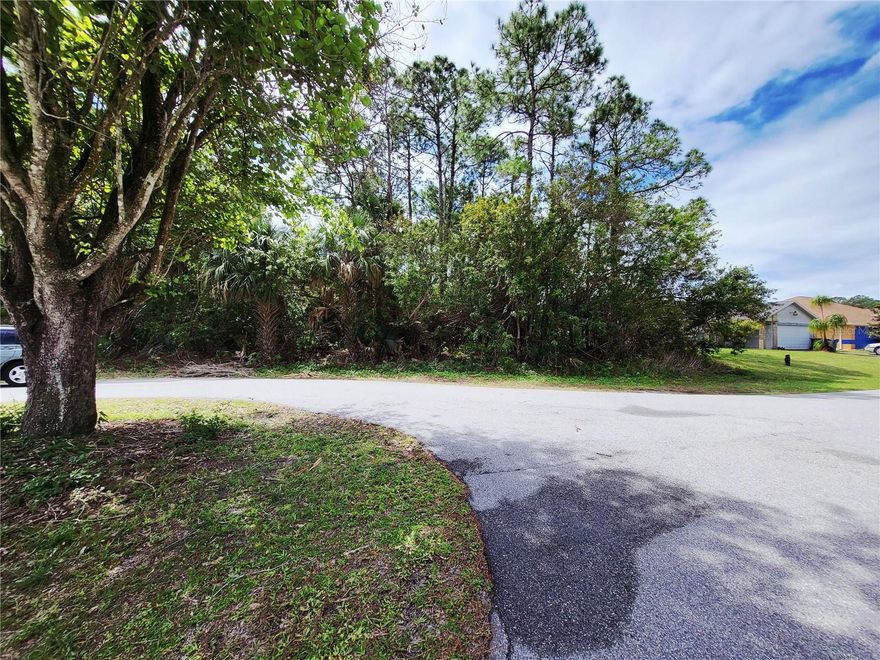 Tucked at the end of a quiet cul-de-sac in an established Palm Bay neighborhood, this wooded lot offers a rare chance to build on your terms in one of Brevard County's fastest-growing cities. Mature trees provide natural privacy and character — the kind of setting that's increasingly hard to find at this price point.
What sets this lot apart: preliminary building plans designed specifically for this property convey with the sale, giving buyers a meaningful head start on the permitting and construction process.
Enjoy convenient access to major roadways, retail, dining, and everyday essentials — all within a short drive. The beaches of the Space Coast are approximately 20–25 minutes away, and major employment corridors along the coast are well within reach.
Palm Bay's continued growth and infrastructure investment make this an attractive play for end-users and investors alike. Whether you're ready to build now or securing land ahead of the curve, this lot checks the right boxes.