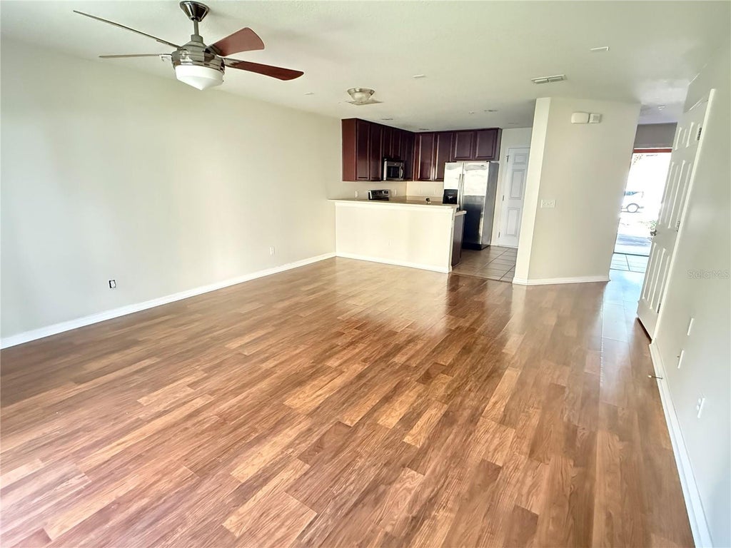 Photo of 287 Winding Vine Lane #34, Orlando, FL 32824 (MLS # O6441384)