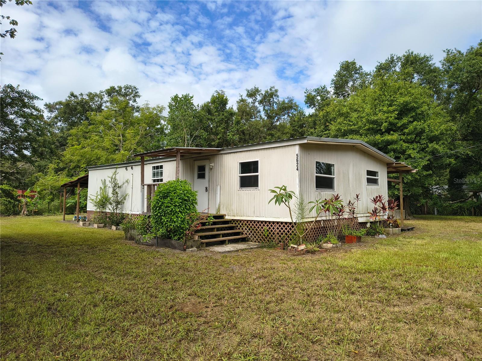 * Seller financing available * This is an amazing deal, affordable double wide manufactured home with 3 bedrooms, 2 bathrooms and metal roof. Enjoy the back and side porches on the summer rains and weekend BBQs. The amazing oversized 0.65 acre lot provides endless opportunities, you can start a fruit and vegetable garden, raise some small farm animals and park your vehicles and toys like boats, RV and 4 wheelers. No HOA, No restrictions. This is a CASH only deal.