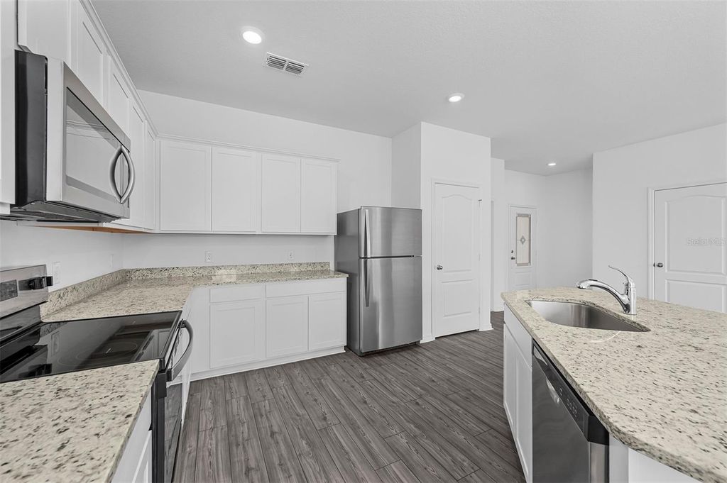 Photo of 556 Bay Leaf Drive, Poinciana, FL 34759 (MLS # TB8484297)