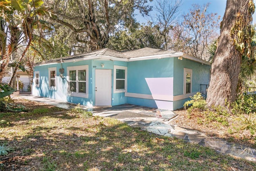 Discover the possibilities of this spacious 3 BR/2BA home with separate garage & studio apartment with full bathroom located on a triple-lot with majestic trees nestled in the heart of Daytona Beach.  The expansive lot provides room for entertaining, boat or RV parking, a pool addition, or simply enjoying the Florida sunshine with added privacy.  Ideally located just minutes from the sun, surf & vibrant attractions of the Daytona Beach Boardwalk and Pier, Daytona Beach International Airport, and the legendary racing events at Daytona International Speedway.   This home offers the perfect balance of coastal lifestyle and everyday convenience, with shopping, dining, entertainment, hospital/health care centers, colleges and Embry-Riddle Aeronautical University all nearby.  Built with solid concrete block construction and plaster walls for lasting strength, this unique residence blends durability with stylish updates.  The separate garage & studio apartment with full bathroom creates outstanding flexibility for guests, extended family, a home office, or rental income potential.  Inside, authentic travertine flooring and crown molding add warmth and character, while the spacious fully-equipped kitchen boasts granite countertops, wood cabinetry, breakfast bar & full backsplash providing an inviting space for cooking and gathering. The primary bedroom serves as a private retreat, featuring an en- suite bathroom and a spacious walk-in closet, while the second bedroom also includes its own walk-in closet for exceptional storage.  All bathrooms have been updated, and a large utility room adds practical functionality to the home. A newer HVAC system ensures year-round comfort.  This awesome property is high & dry and is located in flood zone “X”  offering additional peace of mind.  The expansive triple lot is a rare find in this central location, providing room to expand, entertain, store recreational vehicles, or simply enjoy additional privacy.  This is a unique opportunity to own a spacious, well-built home on a huge lot with income potential in one of Florida’s most iconic beachside communities.