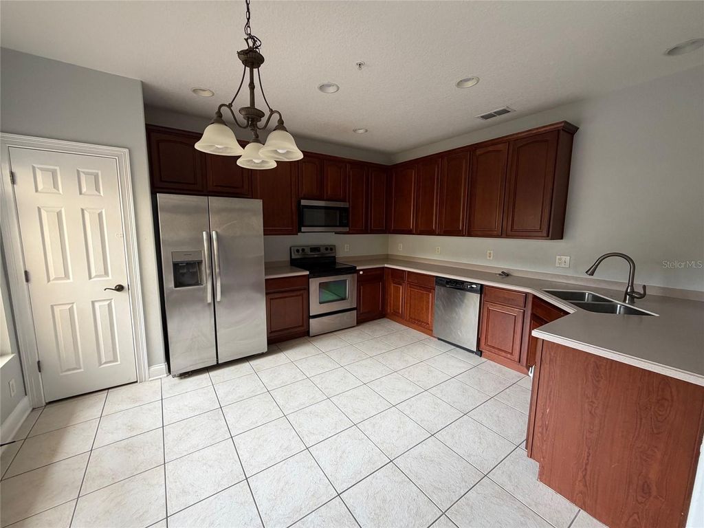Photo of 6833 Piazza Street, Orlando, FL 32819 (MLS # O6393118)