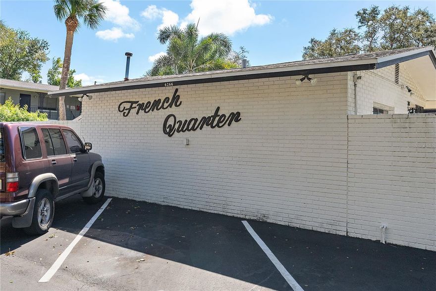 Welcome to The French Quarter Condos…a beautiful and surprising courtyard hidden behind the wall! … This is truly a one of a kind, rarely available and affordable find in the West St Pete, Pasadena / Gulfport area … It just FEELS like home, here … Come see this 2nd (top) floor unit featuring an updated kitchen that opens to the living area, creating a terrific OPEN space for modern living … This condo offers a surprisingly SPACIOUS layout with a HUGE walk-in closet, good-sized bedroom and living room and an assigned (off street) parking space ... The unit is located in a 2-story, gated / “walled" community with a “courtyard” of tropical landscaping, a sparkling POOL, two BBQ grills and a few areas to chill or picnic, a storage space for bikes, and an onsite laundry facility … You can BBQ and take a swim in the pool while doing your laundry! … Life is GOOD at The French Quarter …  This is a great opportunity for homeowners and investors alike! … There are NO restrictions on years of ownership before leasing … it is NOT a 55+ age-restricted community … and there is NO land lease…. Hard to find in this part of town! … The location is central to everything: less than 10 minutes to So. Pasadena, Gulfport, The Beaches of Treasure Island or St Pete Beach, The Pinellas trail and more  …  also the Sun Runner Bus stop is nearby and can take you to Downtown St Pete or to the Beaches… You'll be close to banking, grocery stores, Stetson Law School, and St. Pete College … The low maintenance fee INCLUDES your water, sewer, and trash bills, plus grounds and pool care and insurance on the building …. HURRY on this one! … Make your appointment to see, TODAY!