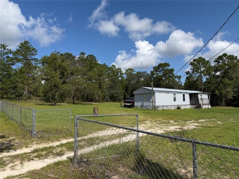 Photo of 5010 S Barker Point, Lecanto, FL 34461 (MLS # OM730607)
