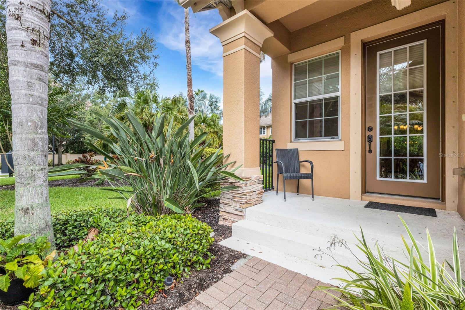 Welcome to this stunning 3 bedroom, 2.5 bathroom end unit home in the gated community of Sonoma. Step inside to find a spacious and inviting living area complete with a great room floor plan. The kitchen, with stainless appliances, plenty of counter and cabinet space, and a breakfast bar, make it perfect for both cooking and entertaining. The home is equipped with low E windows with IMPACT glass throughout allowing for not only protection from mother nature but also sound. Wood flooring was added in the office, stairs, and upstairs hallway. The second-floor bedrooms are generously sized, with the primary bedroom featuring a large walk-in closet with built-in organization systems. Outside, you'll find two screened lanais perfect for enjoying the beautiful Florida weather. This home also boasts a large, luxuriously landscaped lot to the left of the property, adding an extra element of privacy and tranquility. As an added bonus, the roof maintenance and replacement are included in the HOA fees. Residents of Sonoma will love the community amenities, including a heated pool, playground, and basketball courts. Plus, with direct and private access to the Conservatory Park for nature walks, there's no shortage of outdoor activities to enjoy. Located just minutes from UTC, this home offers a prime location with easy access to I-75, the mall, downtown Lakewood Ranch and Sarasota, and the Gulf beaches. Don't miss out on this incredible opportunity to own a piece of paradise in Sonoma.