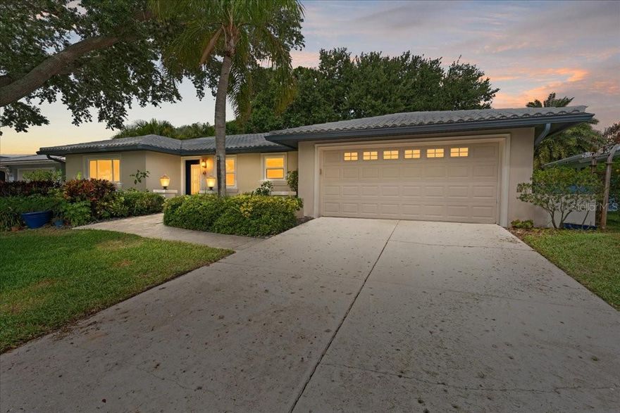 This beautifully updated executive home at 6710 121st Street in Seminole's sought-after Canterbury Chase community offers the perfect blend of refined living and effortless Florida lifestyle. Set on a generously sized lot with mature landscaping, the residence welcomes you with abundant natural light streaming through new hurricane-impact windows, illuminating the fresh interiors and warm engineered hardwood floors that flow throughout all 1,848 square feet.

The heart of the home is a gourmet kitchen designed for both everyday comfort and memorable gatherings. Upgraded quartz counters, solid wood cabinetry, and premium stainless appliances create a space that feels as inspiring as it is functional. Just beyond, the thoughtfully expanded primary suite provides a peaceful retreat, complete with convenient in-suite laundry that was thoughtfully relocated from the garage during the recent remodel.

Step outside to the expansive screened patio, where your eyes settle on a serene pond that serves as a private!