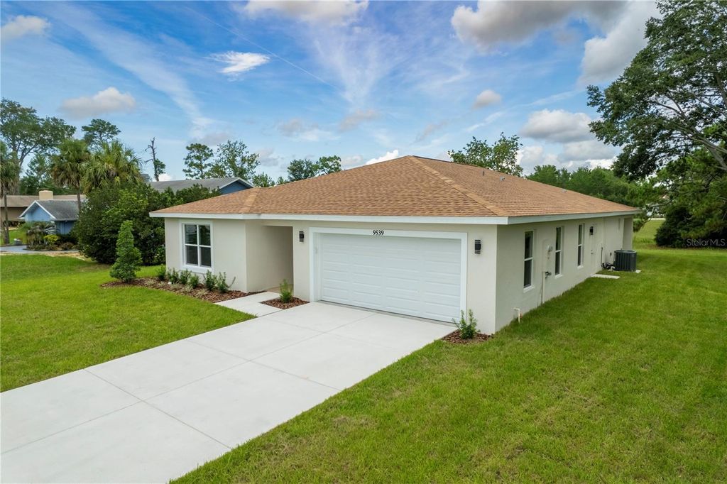Photo of 9539 Northcliffe Boulevard, Spring Hill, FL 34608 (MLS # TB8406304)