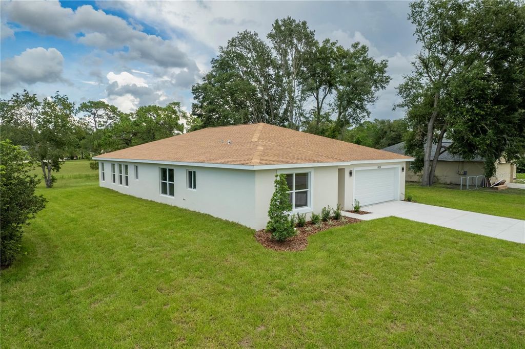 Photo of 9539 Northcliffe Boulevard, Spring Hill, FL 34608 (MLS # TB8406304)
