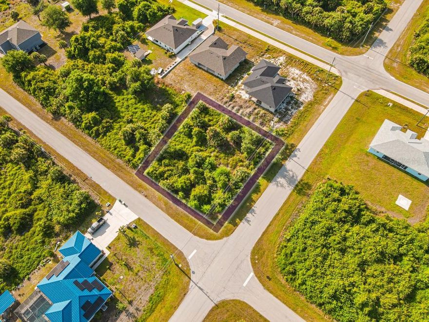 Welcome to 13369 Galveston Ave, an oversized corner lot located in Southwest Florida’s highly desired South Gulf Cove community! This vacant lot has just over 11,000 square feet of land, 204 feet of road frontage, public water and public sewer, and is zoned residential single family. Whether you are looking to build your next home, or simply invest in vacant land, this property is certainly worth looking at. South Gulf Cove has an optional HOA of $120 per year with no obligation to join. You will also find this community has several parks, playground areas, pickleball/basketball courts, and a boat ramp for public use. Located just about 10 minutes from Boca Grande, South Gulf Cove is known for its 55 miles of navigable canals giving boater direct access to the Myakka River and Charlotte Harbor. Stop by today to see this great lot for yourself!