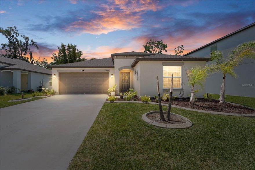 Step into this stunning, like-new 3-bedroom, 2.5-bath home in the sought-after community of Abbot Square! From the moment you walk in, you’ll appreciate the bright, open layout where the family room, dining area, and kitchen come together seamlessly—perfect for entertaining or everyday living. The kitchen is a standout feature, showcasing shaker-style cabinetry, granite countertops, stainless steel appliances, and a large center island that makes cooking and gathering effortless. Porcelain tile flooring flows through the main living areas, while the bedrooms offer cozy carpet for added comfort. The split floor plan provides privacy, with a spacious primary suite that feels like a true retreat. Enjoy a spa-inspired bathroom with a double vanity, ample storage, and a large walk-in closet enhanced with a custom Closet by Design system.
Step outside to your own private escape, where the oversized lanai is perfect for relaxing or entertaining, overlooking a fully fenced backyard with plenty of space for activities, complemented by outdoor pavers, a stylish pergola, and lush landscaping that creates a peaceful setting.
Complete with a 2-car garage offering flexibility for storage or additional needs, this home combines modern finishes, thoughtful design, and inviting outdoor living—all in one impressive package.
Located in the master-planned community of Abbott Square, residents enjoy resort-style amenities including a pool, clubhouse, fitness center, playground, walking trails, and outdoor spaces with grilling areas. The low HOA fee includes high-speed internet for added convenience. Ideally situated in Zephyrhills, just minutes from Wesley Chapel, you’ll have easy access to shopping, dining, medical facilities, and major highways—offering the perfect blend of comfort and accessibility. Schedule your showing today!